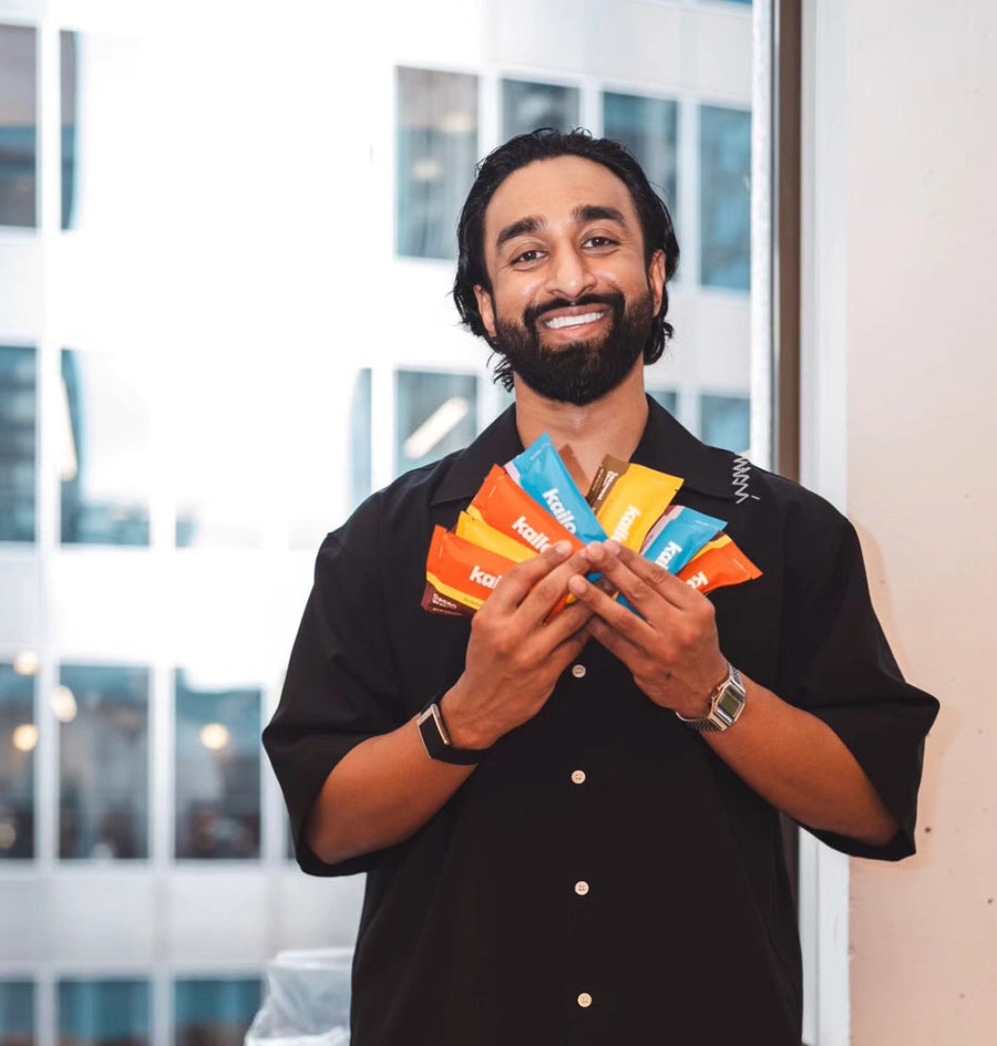 Kailo founder Sri Kalapala holding a fan of Kailo bars